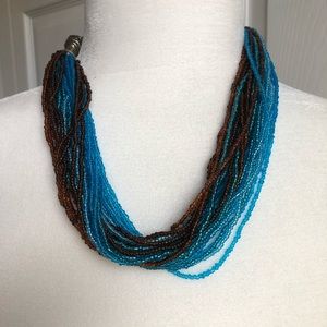 strands of beads in turquoise & brown